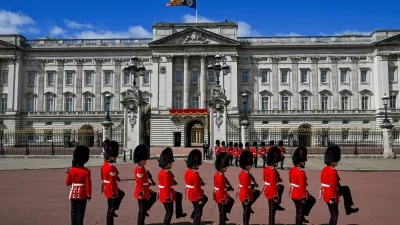 FILE PHOTO: Members of the Household Division march in front of the Buckingham Palace during the Trooping the Colour parade to honour Britain's King Charles, as part of the official birthday celebrations, in London, Britain, June 13, 2026. REUTERS/Chris J. Ratcliffe/File Photo