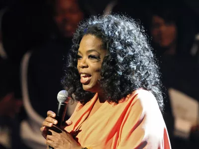 In this Friday, June 8, 2012, photo provided by TDJ Enterprise/Front Page Firm, Oprah Winfrey appears onstage at TD Jakes 35th anniversary of ministry at the Winspear Opera House in Dallas. (AP Photo/TDJ Enterprise/Front Page Firm, Vernon Bryant)