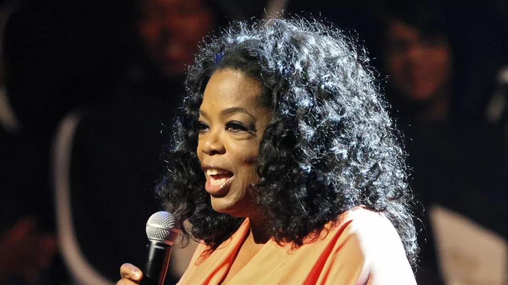In this Friday, June 8, 2012, photo provided by TDJ Enterprise/Front Page Firm, Oprah Winfrey appears onstage at TD Jakes 35th anniversary of ministry at the Winspear Opera House in Dallas. (AP Photo/TDJ Enterprise/Front Page Firm, Vernon Bryant)