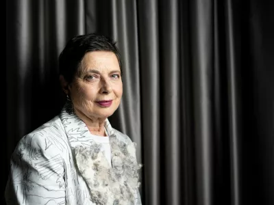 Actress Isabella Rossellini of Italy poses after winning the "Excellence Award 2026" at the 79th Locarno Film Festival, in Locarno, Switzerland, Wednesday, Aug. 5, 2026. (Jean-Christophe Bott/Keystone via AP)