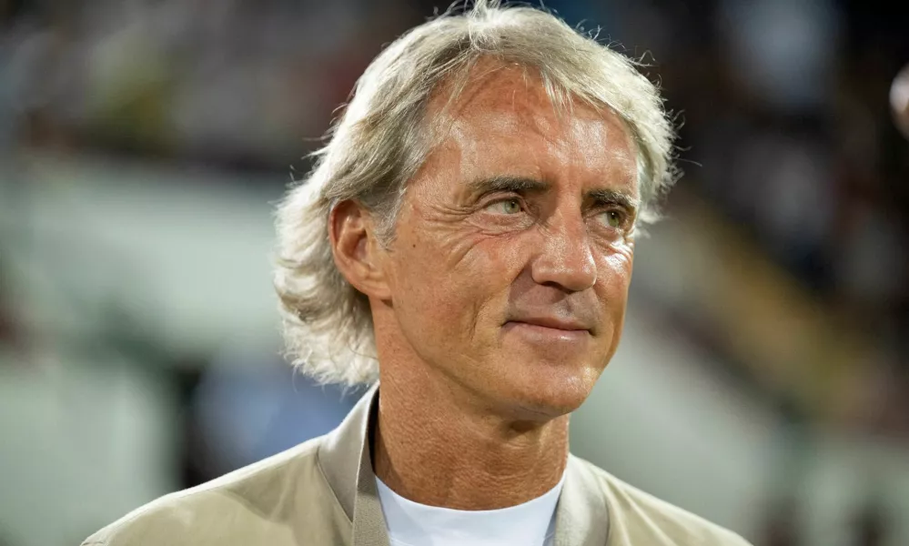 Football manager Roberto Mancini smiles during a 'Partita del cuore' charity match in L'aquila, Italy, July 13, 2026. Mancini was named national team coach for a second spell, Italian Football Federation (FIGC) President Giovanni Malago said on July 28, 2026. REUTERS/Augusto Casasoli
