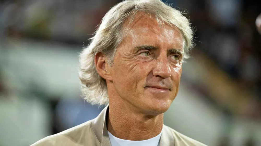 Football manager Roberto Mancini smiles during a 'Partita del cuore' charity match in L'aquila, Italy, July 13, 2026. Mancini was named national team coach for a second spell, Italian Football Federation (FIGC) President Giovanni Malago said on July 28, 2026. REUTERS/Augusto Casasoli