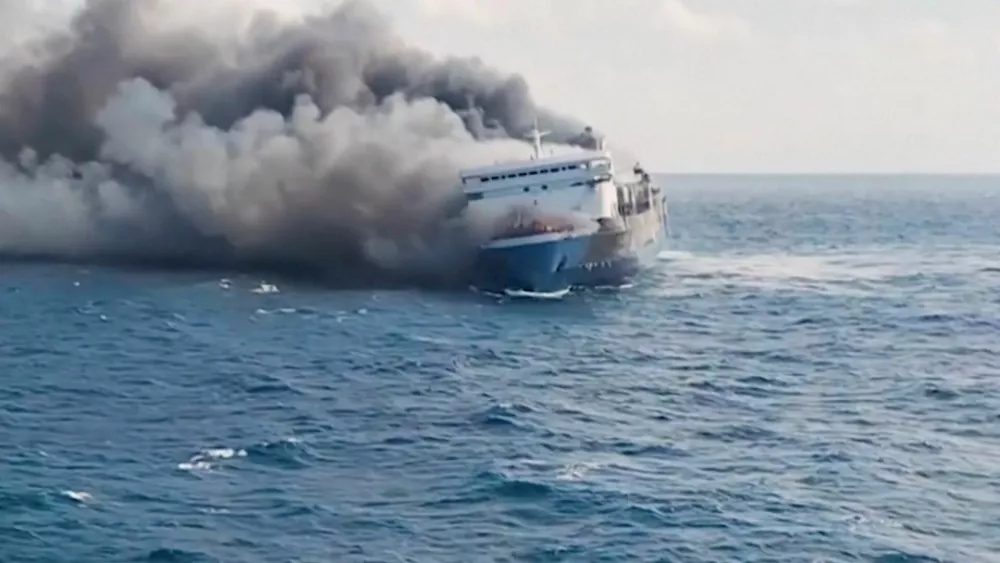 Plumes of smoke rise from a ferry which caught fire off Indonesia's Madura island, according to statement by the Indonesian search and rescue agency, in this screengrab obtained from a video, East Java province, Indonesia, August 2, 2026. National Search and Rescue Agency (BASARNAS)/Handout via REUTERS  ATTENTION EDITORS - THIS IMAGE HAS BEEN SUPPLIED BY A THIRD PARTY. MANDATORY CREDIT.