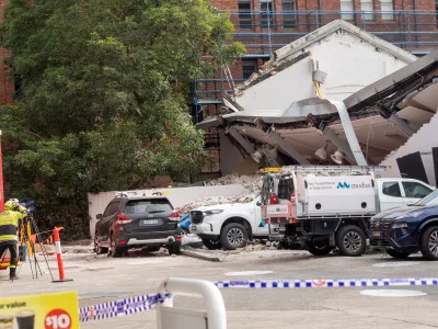 Emergency services respond to a building collapse in Sydney, Australia, August 3, 2026. REUTERS/Jeremy Piper