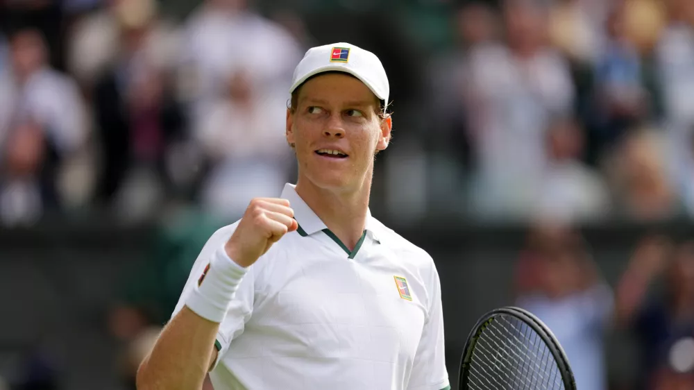 Jannik Sinner of Italy celebrates winning the men's singles match against Miomir Kecmanovic of Serbia during at the Wimbledon Tennis Championships in London, Monday, June 29, 2026.(AP Photo/Kin Cheung)