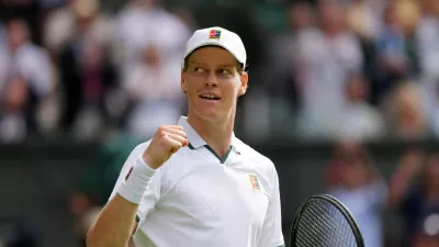Jannik Sinner of Italy celebrates winning the men's singles match against Miomir Kecmanovic of Serbia during at the Wimbledon Tennis Championships in London, Monday, June 29, 2026.(AP Photo/Kin Cheung)