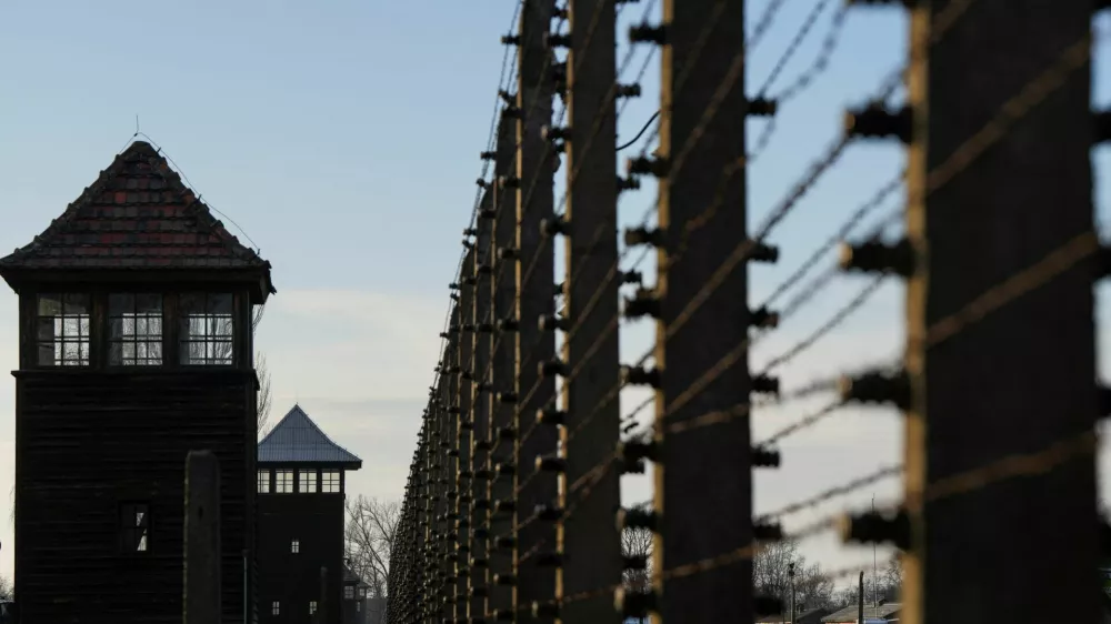 A barbed wire is seen at the site of the former Nazi German concentration and extermination camp Auschwitz-Birkenau prior to the 80th anniversary of the liberation of the camp in Brzezinka, Poland, January 26, 2025. REUTERS/Aleksandra Szmigiel