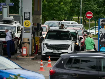 Vehicles refuel at a Rosneft gas station in Moscow, Monday, June 29, 2026. (AP Photo/Alexander Zemlianichenko)