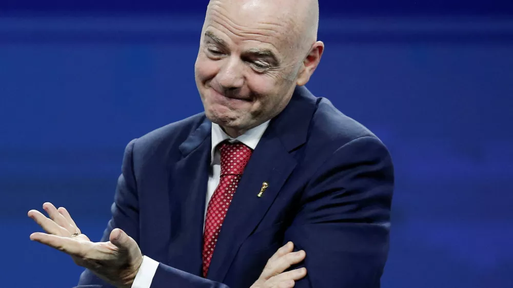 FIFA President Gianni Infantino reacts on stage during a gala celebrating Conmebol's President Alejandro Dominguez's 10th anniversary as head of the organization, in Asuncion, Paraguay, January 26, 2026. REUTERS/Cesar Olmedo