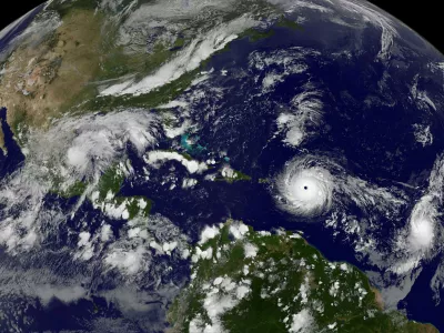 Hurricane Irma, a record Category 5 storm, churns across the Atlantic Ocean on a collision course with Puerto Rico and the Virgin Islands, is shown in this NASA GOES satellite image taken at 1715 EDT (2215 GMT) on September 5, 2017. Courtesy NASA/Handout via REUTERS   ATTENTION EDITORS - THIS IMAGE WAS PROVIDED BY A THIRD PARTY   TPX IMAGES OF THE DAY