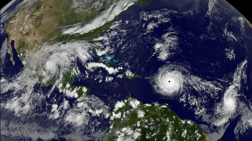 Hurricane Irma, a record Category 5 storm, churns across the Atlantic Ocean on a collision course with Puerto Rico and the Virgin Islands, is shown in this NASA GOES satellite image taken at 1715 EDT (2215 GMT) on September 5, 2017. Courtesy NASA/Handout via REUTERS   ATTENTION EDITORS - THIS IMAGE WAS PROVIDED BY A THIRD PARTY   TPX IMAGES OF THE DAY