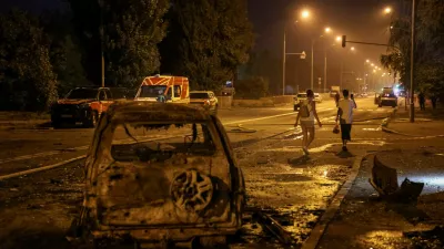 Residents leave the site of a Russian missile strike, amid Russia's attack on Ukraine, in Kyiv region, Ukraine August 1, 2026. REUTERS/Anatolii Stepanov