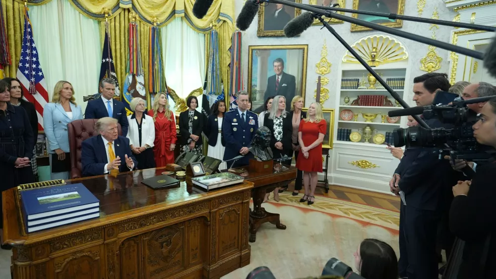 President Donald Trump speaks during a meeting about military families, in the Oval Office of the White House, Monday, Aug. 3, 2026, in Washington. (AP Photo/Alex Brandon)