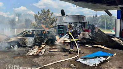 In this photo provided by the Ukrainian Emergency Service, firefighters put out a fire at a gas station following a Russian drone attack in Dnipropetrovsk region, Ukraine, Monday, Aug. 3, 2026. (Ukrainian Emergency Service via AP)