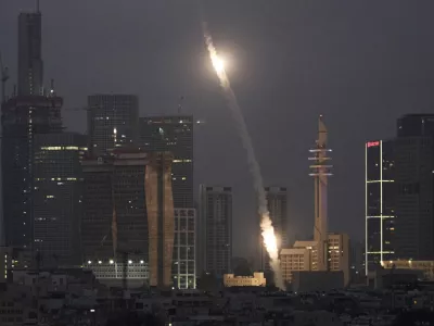 Israeli Iron Dome air defense system fires to intercept projectiles over Tel Aviv, Saturday, June 14, 2025. (AP Photo/Leo Correa)