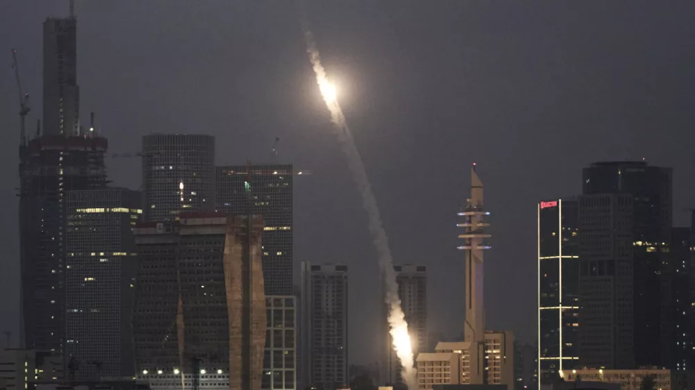 Israeli Iron Dome air defense system fires to intercept projectiles over Tel Aviv, Saturday, June 14, 2025. (AP Photo/Leo Correa)