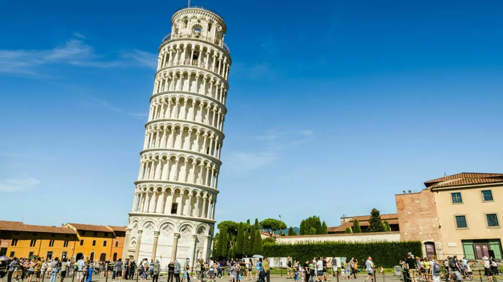 Pisa, Italy - August 17, 2014: The Leaning Tower of Pisa in the Square of Miracles (Piazza dei Miracoli).
