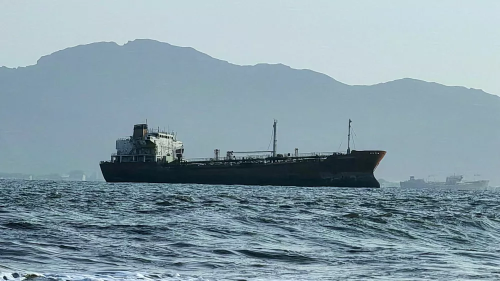 FILE PHOTO: A ship off the port of Aden, where traffic remained steady after the Iran-aligned Houthis said their forces had carried out missile and drone strikes on Saudi oil tankers, in Aden, Yemen, July 23, 2026. REUTERS/Stringer/File Photo