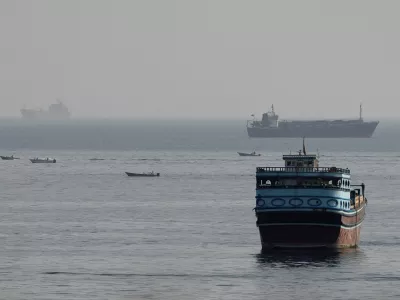 FILE PHOTO: Vessels in the Strait of Hormuz, as seen from Musandam, Oman, August 3, 2026. REUTERS/Stringer/File Photo