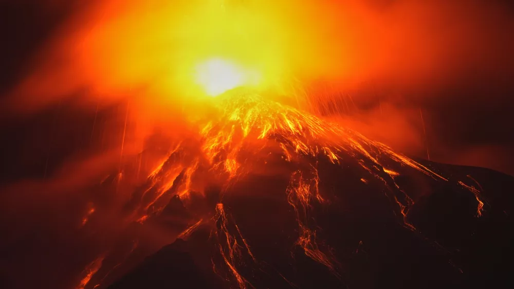 Lava flows out of the crater of the Fuego Volcano, as seen from San Juan Alotenango, Guatemala, Tuesday, Aug. 4, 2026. (AP Photo/Moises Castillo)