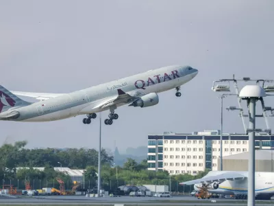 FILE -A Qatar Airways plane takes off from Leipzig/Halle Airport, July 18, 2025, Saxony, Schkeuditz. (Jan Woitas/dpa/dpa via AP, File)