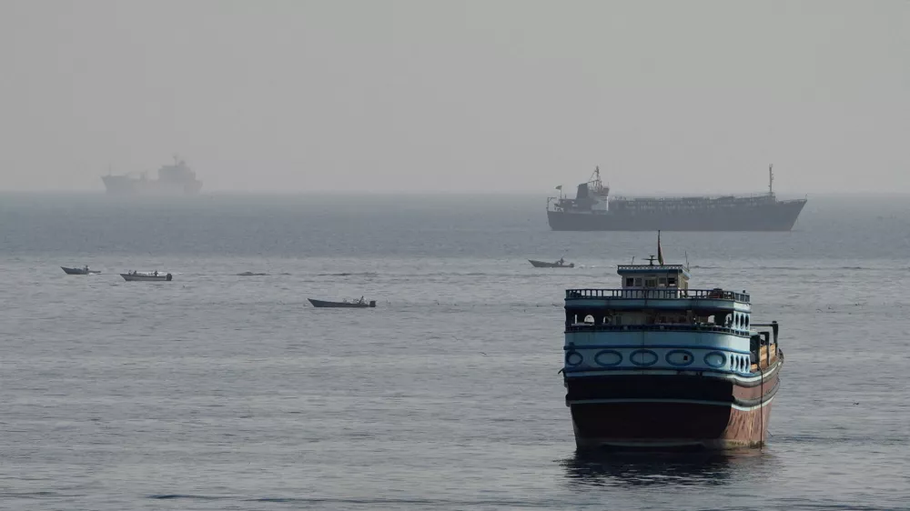 FILE PHOTO: Vessels in the Strait of Hormuz, as seen from Musandam, Oman, August 3, 2026. REUTERS/Stringer/File Photo
