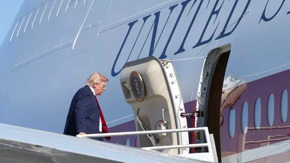 President Donald Trump boards Air Force One at Harry Reid International Airport in Las Vegas, Wednesday, Aug. 5, 2026. (AP Photo/Mark Schiefelbein)