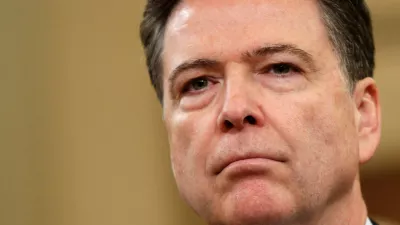FILE PHOTO: FBI Director James Comey waits before testifying at a House Intelligence Committee hearing into alleged Russian meddling in the 2016 U.S. election, on Capitol Hill in Washington, U.S., March 20, 2017. REUTERS/Joshua Roberts/File Photo