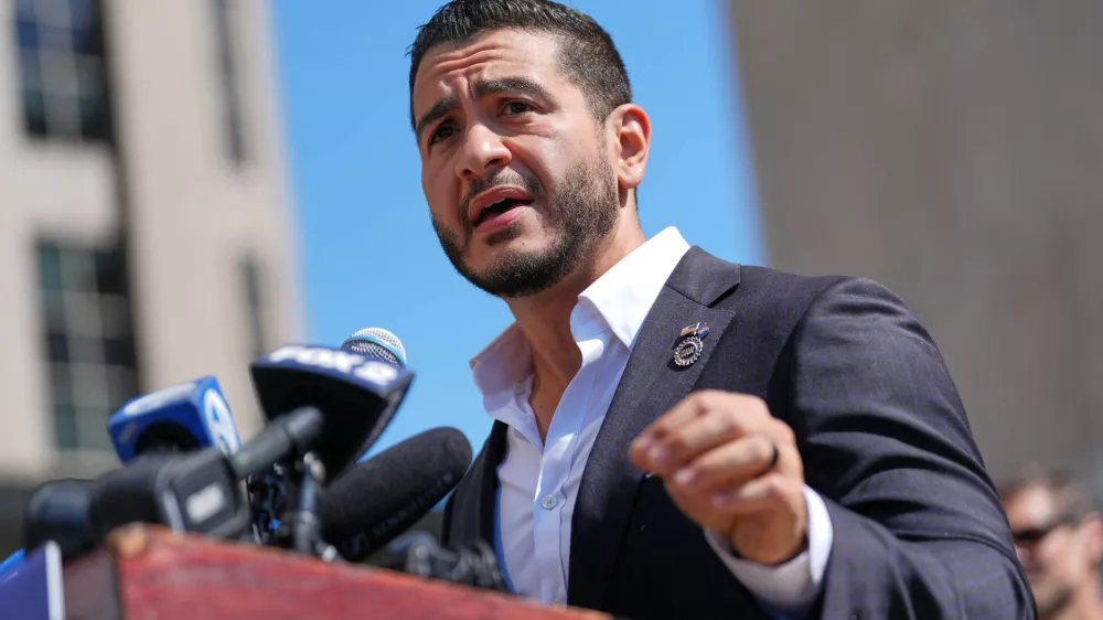 Abdul El-Sayed speaks during a news conference at the Spirit of Detroit shortly after winning the Democratic nomination for U.S. Senate in Michigan, Wednesday, Aug. 5, 2026, in Detroit. (AP Photo/Julia Demaree Nikhinson)