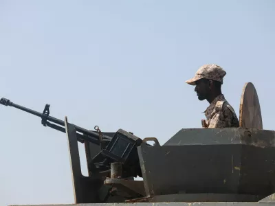 FILE PHOTO: A Yemeni soldier mans a machine gun mounted on a military patrol truck on the coast of Bab el-Mandeb, Yemen April 2, 2026. REUTERS/File Photo