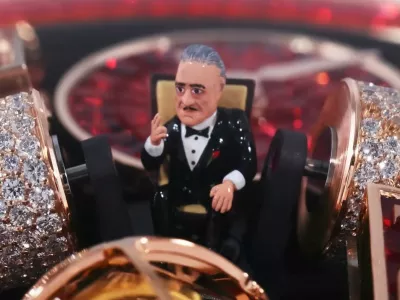 Ferrari Press AgencyGodfather 1Ref 1802906/08/2026See Ferrari textPictures MUST credit: Jacob & CoOstentatious jewellery company Jacob & Co has made a new timepiece tribute to classic movie The Godfather &mdash; including a miniature of star Marlon Brando as Mafia boss Don Vito Corleone.The .4 million USD timepiece is a one-off by the New York-based house.Called the Opera Godfather Baguette, it features a host of details from the 1972 Francis Ford Coppola masterpiece.A tiny, hand-sculpted figurine of Brando sitting in his iconic armchair sits right at the centre of the dial.A miniature rose gold piano sits on the dial, its keys moving while a music box plays the movie's signature GodfatherTheme, alongside a violin-shaped crank.The iconic poster puppet strings logo is integrated onto the dial plates. The watch is set with 461 red baguette sapphires across the 18 karat rose gold case, dial, crown and clasp.Each stone was individually cut to fit one position on the watch, a setting process that took craftsmen " months " to complete. Jacob & Co said the gem-setting arrangement will never be replicated again. It took the brand over a year just to source and match the colour, quality, and consistency of the stones. The watch contains 658 components built entirely by hand, combining high-end watchmaking with micro-mechanical engineering.OPS: The Opera Godfather Baguette watch.Picture supplied by Ferrari,Image: 1121010620, License: Rights-managed, Restrictions:, Model Release: no 