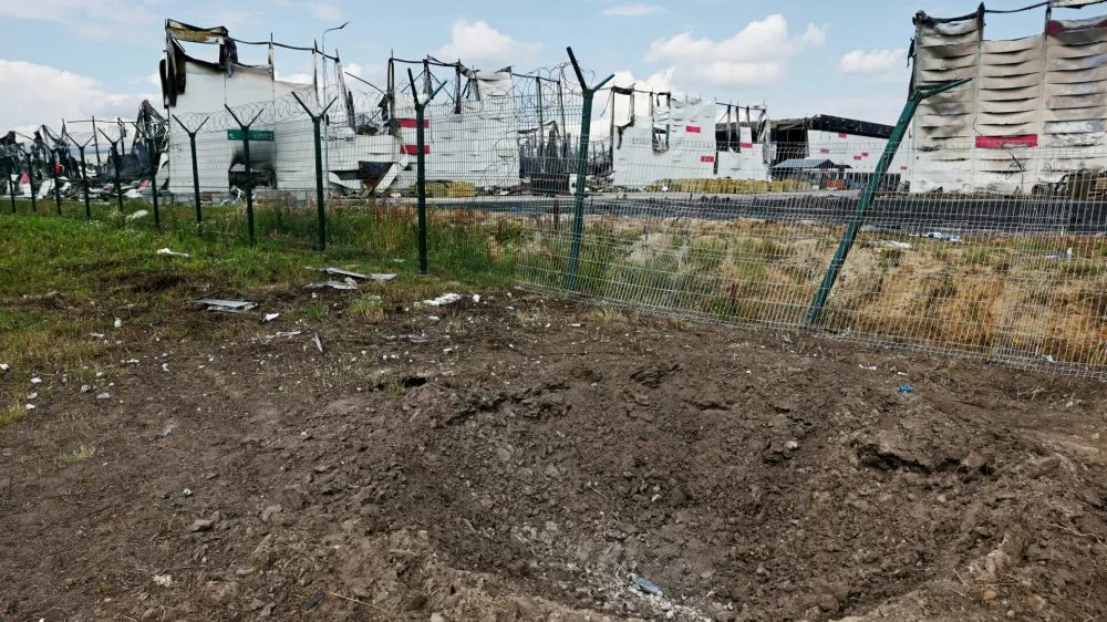 FILE PHOTO: A crater near the remains of the Wildberries warehouse that burned down after a recent Ukrainian drone attack in the course of the Russia-Ukraine conflict, in the city of Elektrostal in the Moscow region, Russia July 23, 2026. REUTERS/Stringer/File Photo