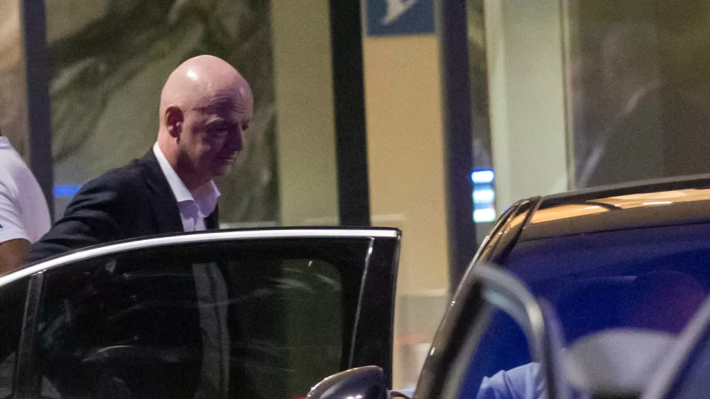 FIFA president Gianni Infantino leaves after attending a Women AFCON 2026 soccer match between Malawi and Zambia, in Rabat, Morocco, Wednesday, Aug. 5, 2026. (AP Photo)