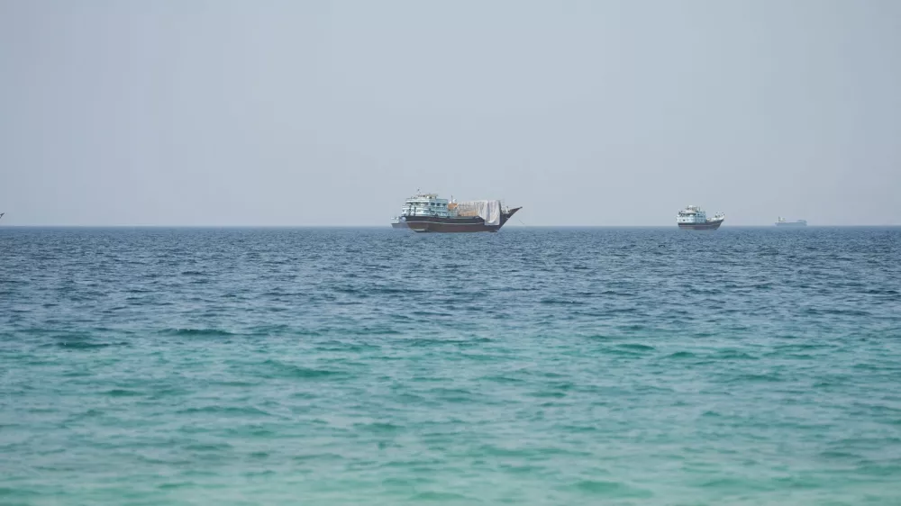 Vessels near the Strait of Hormuz, as seen from Musandam, Oman, August 6, 2026. REUTERS/Stringer