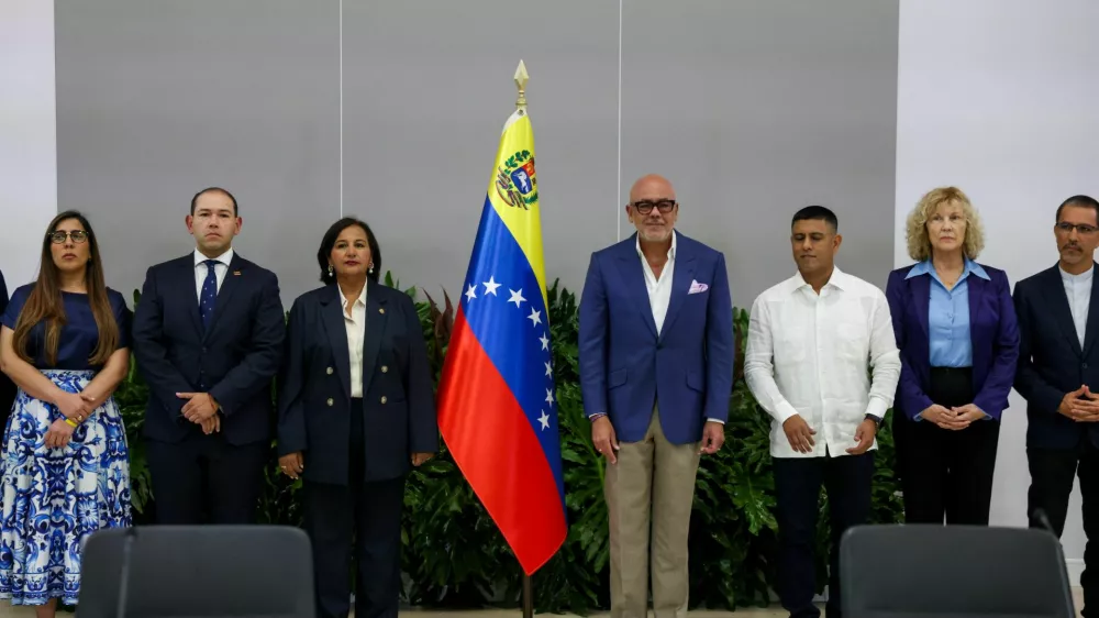Venezuela's National Assembly President Jorge Rodriguez and former opposition lawmaker Dinorah Figuera attend the opening session of the national dialogue in Caracas, Venezuela, August 6, 2026. REUTERS/Leonardo Fernandez Viloria