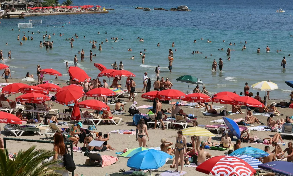 SPLIT, July 20, 2026 -- People enjoy leisure time at Bacvice Beach in Split, Croatia, on July 19, 2026.,Image: 1117480162, License: Rights-managed, Restrictions:, Model Release: no 