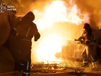 Firefighters work at a compound of car garages damaged during overnight Russian missile strikes, amid Russia's attack on Ukraine, in Kyiv, Ukraine August 8, 2026. Press service of the State Emergency Service of Ukraine/Handout via REUTERS ATTENTION EDITORS - THIS IMAGE HAS BEEN SUPPLIED BY A THIRD PARTY. DO NOT OBSCURE LOGO.