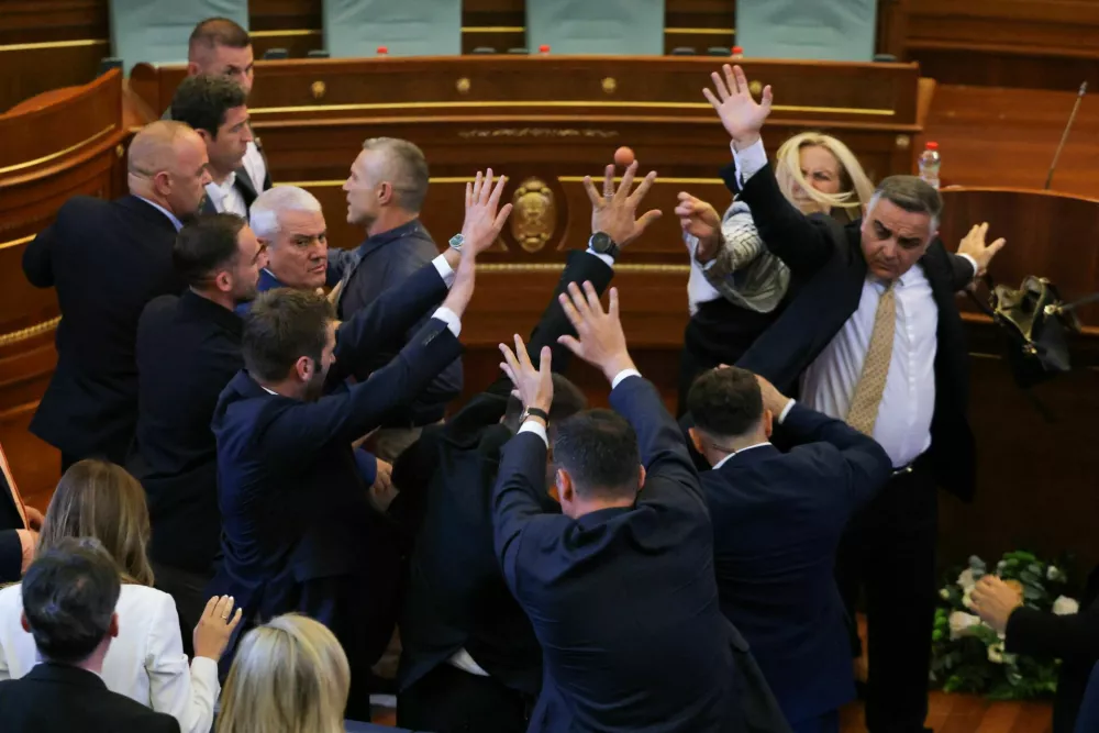 Kosovo lawmaker Time Kadriaj throws an egg at Prime Minister Albin Kurti (not pictured) during the plenary session to elect the new speaker of the parliament in Pristina, Kosovo, August 8, 2026. Kosovo parliament remains unconstituted. REUTERS/Valdrin Xhemaj