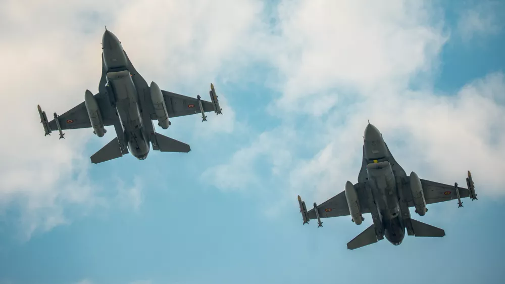 Romanian F-16 fighter jets fly during an air policing exercise at Borcea Air Base 86, amid heightened security concerns over cross-border drone incursions linked to Russia's war in Ukraine, in Borcea, Romania, Friday, Aug. 7, 2026. (AP Photo/ Vadim Ghirda)