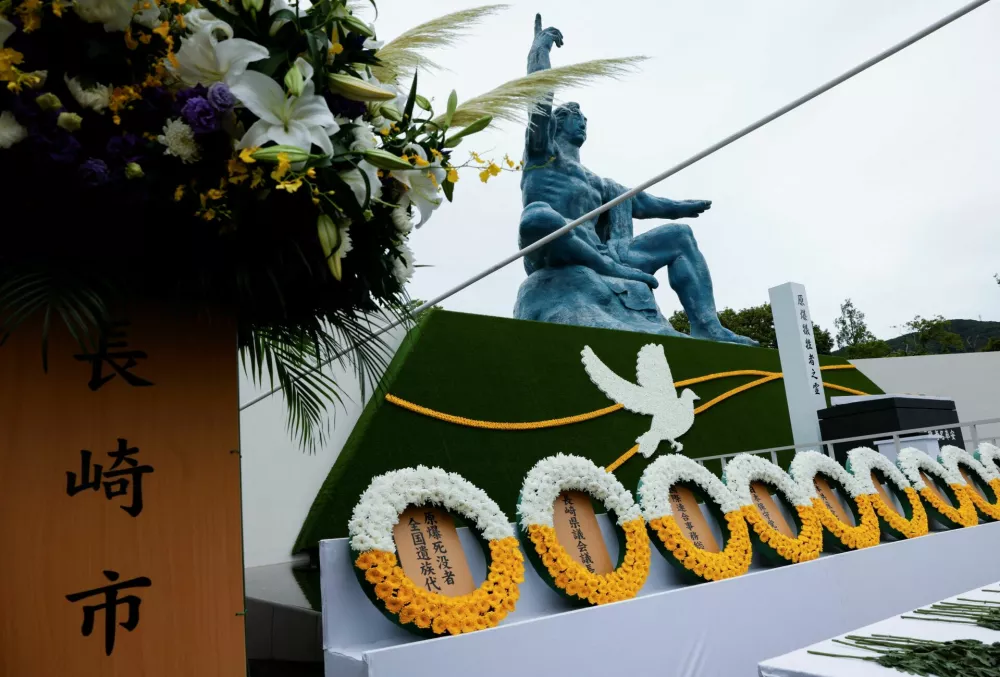 Flower wreaths are placed in front of the Nagasaki Peace Statue on the day of a ceremony commemorating the 81st anniversary of the bombing of Nagasaki at Nagasaki Peace Park in southwestern Japan, August 9, 2026. REUTERS/Manami Yamada