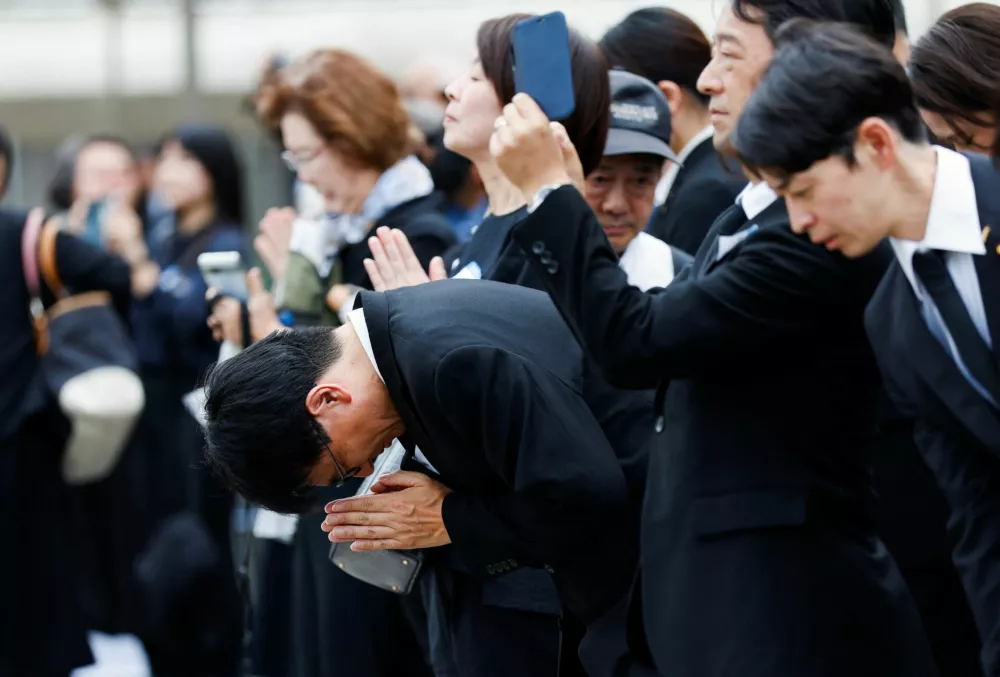 Attendees pray for the victims of the 1945 atomic bombing during a ceremony commemorating the 81st anniversary of the bombing of Nagasaki at Nagasaki Peace Park in southwestern Japan, August 9, 2026. REUTERS/Manami Yamada