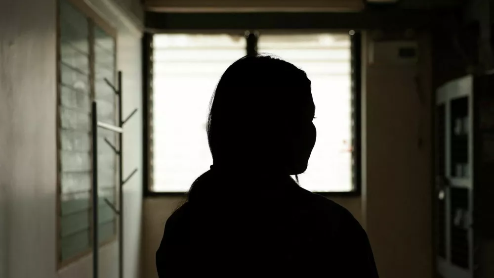 Khim, a 14-year-old eighth-grade student at Debsirin Nonthaburi School, poses for a picture at her home during an exclusive interview with Reuters about what she saw and witnessed during the shooting incident at the school, a day after the incident, in Bang Kruai district, Nonthaburi province, on the outskirts of Bangkok, Thailand, August 8, 2026. REUTERS/Chalinee Thirasupa