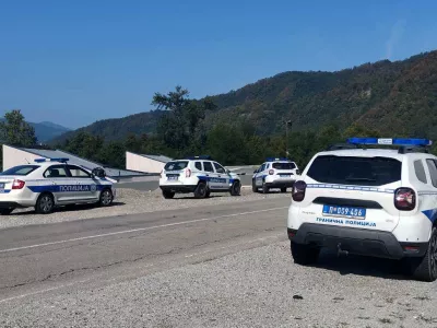 This handout photograph made available by the Ministry of Interior of Serbia shows Serbian Police cars parked near a bank of the Drina River as police search the river after a boat carrying 30 illegal migrants sank on the border between Serbia and Bosnia-Herzegovina, near the town of Ljubovija, on August 22, 2024. Authorities recovered 10 bodies, including an infant, after a boat carrying migrants capsized on August 22, 2024 in the Drina River on the Serbia-Bosnia border, with others still believed missing. Police said the vessel was carrying around two dozen migrants when it flipped near Ljubovija in Serbia, a transit country on the so-called "Balkan route" that migrants use to reach the EU.,Image: 900783743, License: Rights-managed, Restrictions: RESTRICTED TO EDITORIAL USE - MANDATORY CREDIT "AFP PHOTO / Ministry of Interior of Serbia" - NO MARKETING NO ADVERTISING CAMPAIGNS - DISTRIBUTED AS A SERVICE TO CLIENTS, ***HANDOUT image or SOCIAL MEDIA IMAGE or FILMSTILL for EDITORIAL USE ONLY! * Please note: Fees charged by Profimedia are for the Profimedia's services only, and do not, nor are they intended to, convey to the user any ownership of Copyright or License in the material. Profimedia does not claim any ownership including but not limited to Copyright or License in the attached material. By publishing this material you (the user) expressly agree to indemnify and to hold Profimedia and its directors, shareholders and employees harmless from any loss, claims, damages, demands, expenses (including legal fees), or any causes of action or allegation against Profimedia arising out of or connected in any way with publication of the material. Profimedia does not claim any copyright or license in the attached materials. Any downloading fees charged by Profimedia are for Profimedia's services only. * Handling Fee Only ***, Model Release: no 
