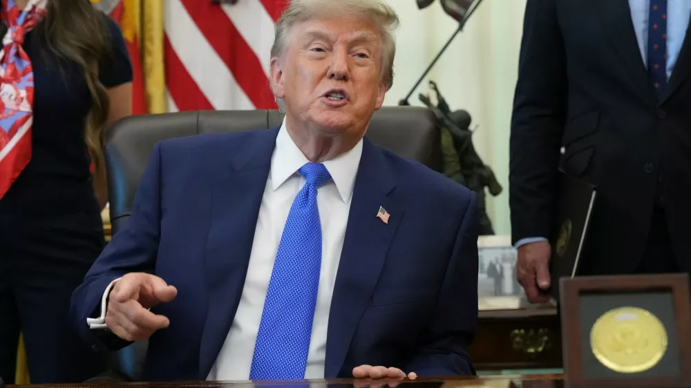 President Donald Trump speaks during a meeting to sign an executive order about vaccines, Monday, Aug. 10, 2026, in the Oval Office of the White House in Washington. (AP Photo/Jacquelyn Martin)