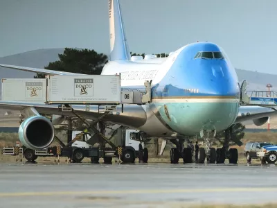 Catering trucks are parked at Air Force One on the tarmac before U.S. President Donald Trump departs following the NATO summit at Ankara International Airport in Ankara, Turkey, Wednesday, July 8, 2026. (AP Photo/Alex Brandon)