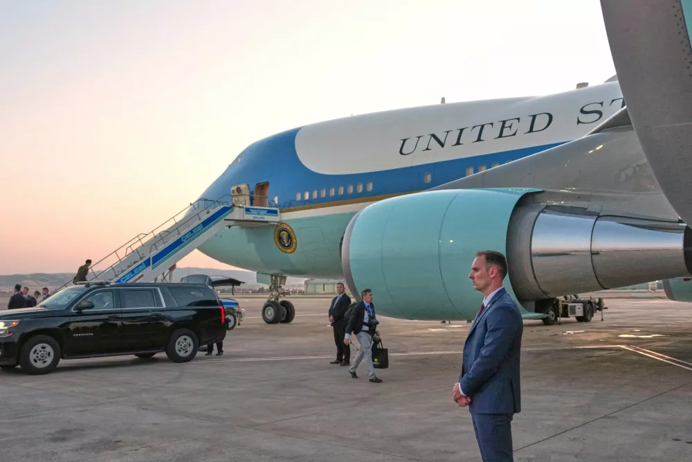 A catering truck is visible parked on the opposite side of Air Force One on the tarmac before U.S. President Donald Trump departs following the NATO summit at Ankara International Airport in Ankara, Turkey, Wednesday, July 8, 2026. (AP Photo/Alex Brandon)