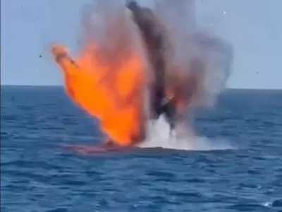 An explosion of what Romanian Defence Minister Radu Miruta said was one of two Gerbera-type drones drifting in Romania's Black Sea exclusive economic zone near the offshore gas project Neptun Deep, in this frame taken from a handout video released on August 11, 2026. Radu Miruta via Facebook/Handout via REUTERS THIS IMAGE HAS BEEN SUPPLIED BY A THIRD PARTY. NO RESALES. NO ARCHIVES