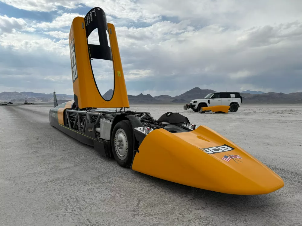 The JCB Hydromax sits on the Bonneville Salt Flats in Wendover, Utah, where Andy Green aims to drive it to a land speed record for cars powered by hydrogen internal combustion engines, Monday, Aug. 10, 2026. (AP Photo/Hannah Schoenbaum)