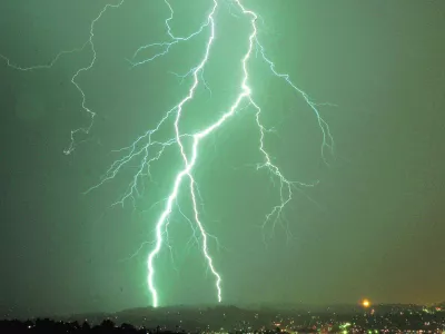 Bolts of lighting strike over Los Angeles early Monday morning, Oct. 17, 2005, in this view looking northeast from above the Hollywood Bowl. (AP Photo/Mike Meadows)------6k