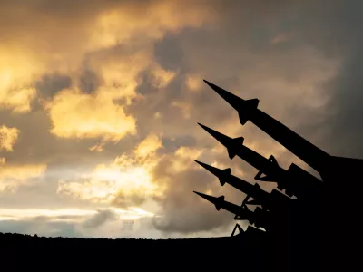The missiles are aimed to the sky at sunset. Nuclear bomb, chemical weapons, missile defense, a system of salvo fire.